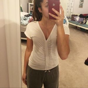 White t-shirt that bunches at the front